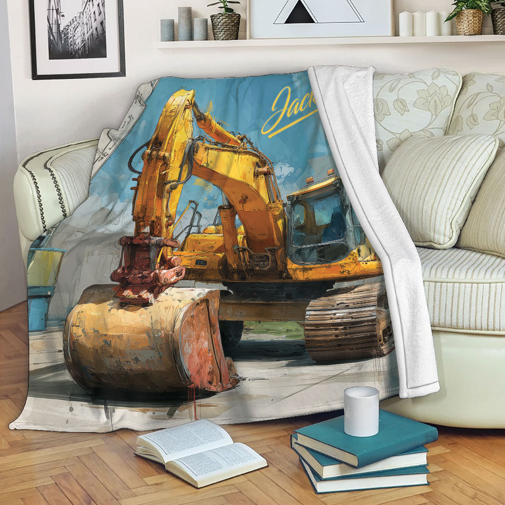 Excavator throw blanket displayed on a sofa with bold yellow construction equipment artwork