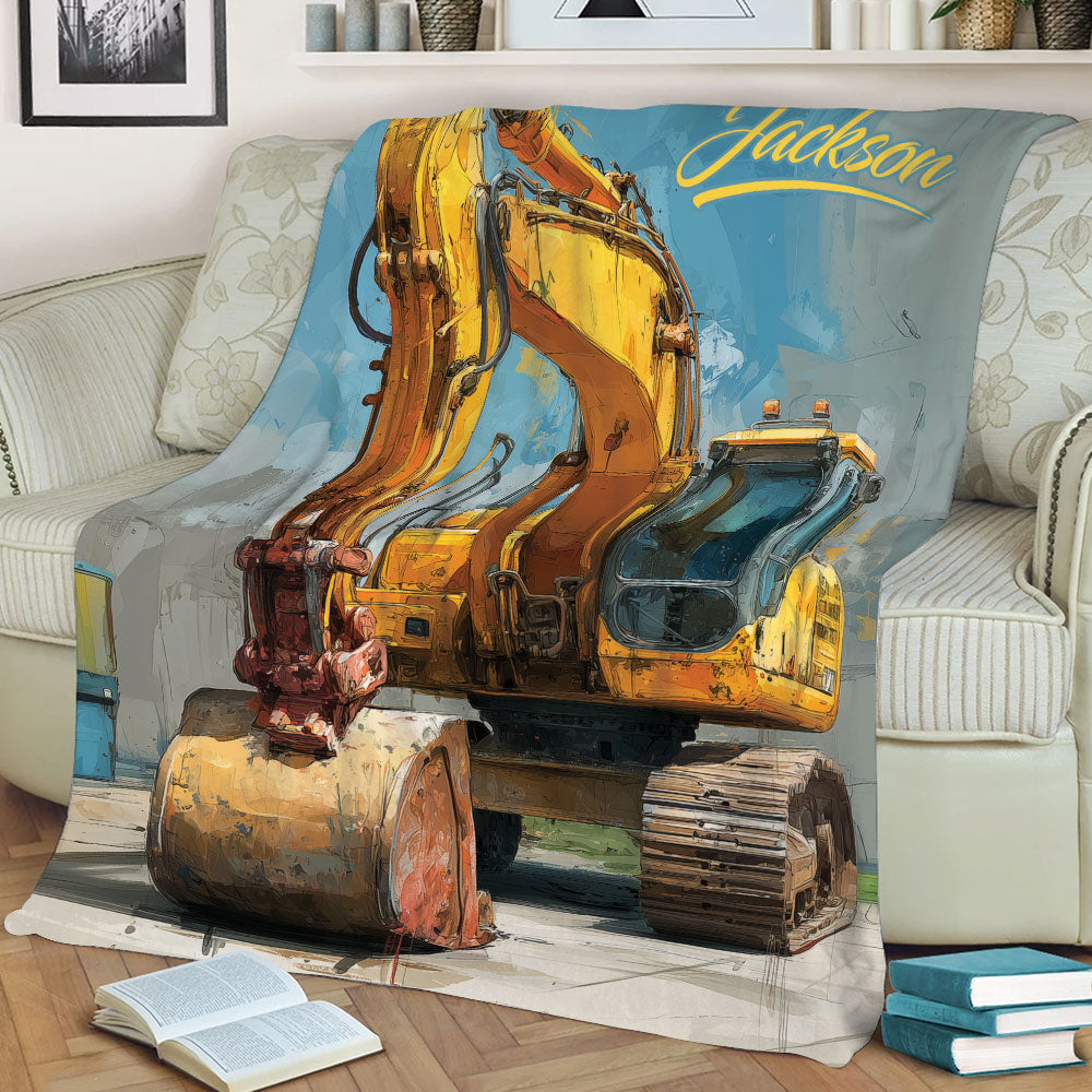 Illustrated excavator blanket draped over a sofa with vibrant yellow machinery artwork