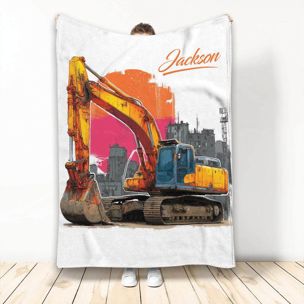 Custom excavator blanket featuring an orange and yellow tracked machine with urban construction artwork