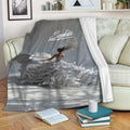 Piano blanket displayed on a sofa with a pianist, grand piano, and sheet music design
