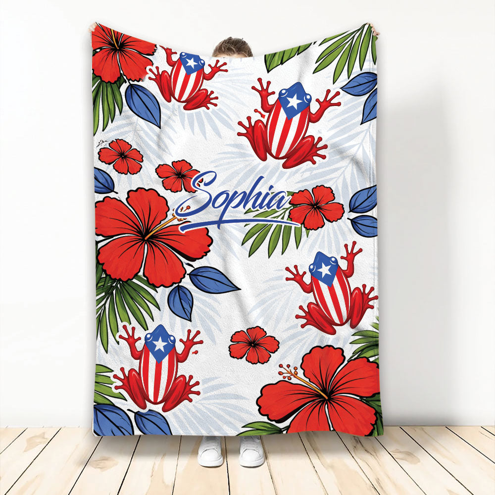 Puerto Rico throw blanket featuring flag-inspired frogs, red hibiscus flowers, tropical leaves, and custom artwork