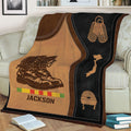 Close view of Vietnam Veteran throw blanket featuring combat boots, helmet, Vietnam map, and vintage military styling