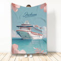 Cruise ship blanket with ocean artwork, turquoise water, and pink floral accents