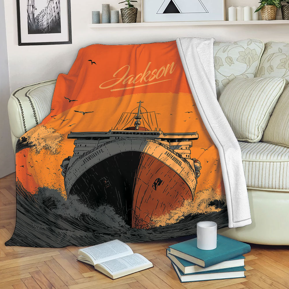 Cruise ship blanket draped over a sofa with dramatic orange ocean liner artwork and waves