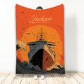 Cruise ship throw blanket held upright with bold orange sunset, ocean waves, and flying seabirds