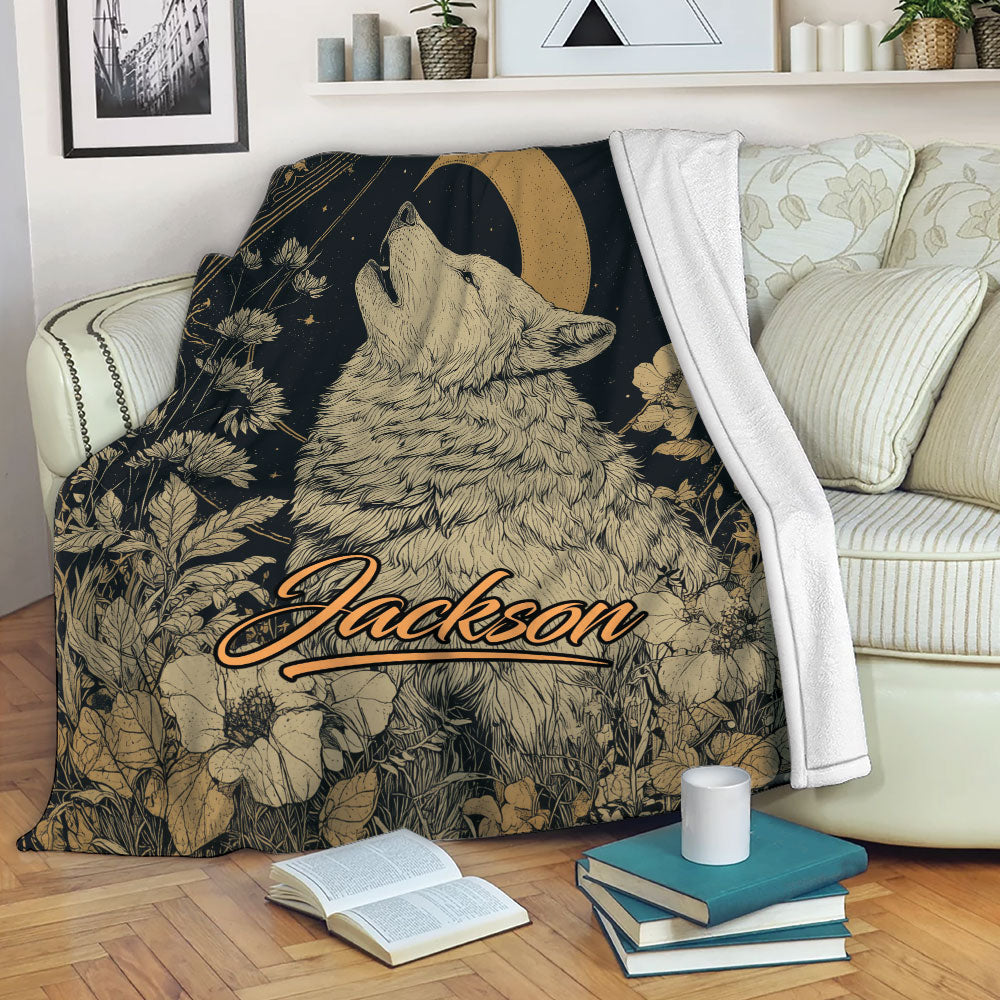 Custom wolf blanket displayed on a sofa with moon, flowers, and nighttime wildlife artwork