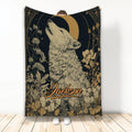 Wolf throw blanket with moonlit floral artwork in a vintage black and gold design