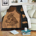 Tiger throw blanket displayed on a sofa with bold wildlife artwork and earthy brown tones