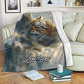 Tiger throw blanket draped over a sofa with forest scenery and cozy living room decor
