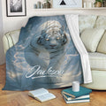 Tiger throw blanket displayed on a sofa with dramatic blue wildlife artwork