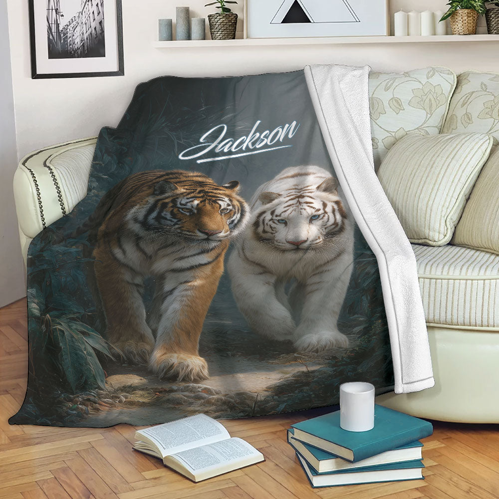 Tiger blanket draped across a living room sofa with orange and white tiger artwork