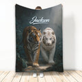 Tiger throw blanket featuring orange and white tigers walking through a dark jungle scene