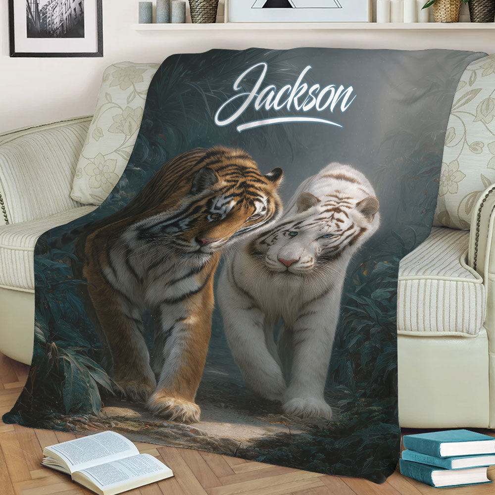 Tiger throw blanket displayed on a sofa with dramatic wildlife artwork and jungle foliage