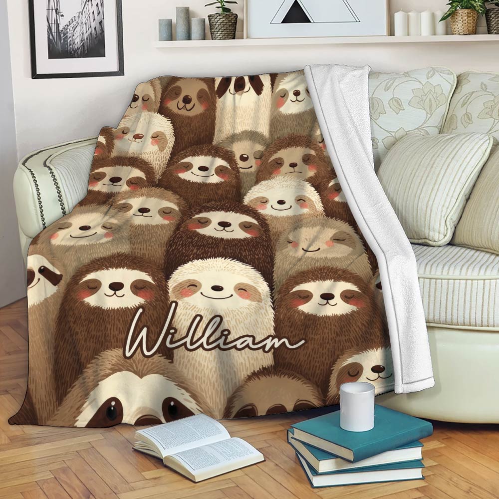 Custom sloth throw blanket draped over a sofa with a cozy woodland animal pattern