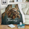 Sloth throw blanket draped over a sofa with a peaceful leafy forest design