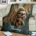 Cozy sloth blanket displayed in a living room with a sleepy sloth and woodland foliage