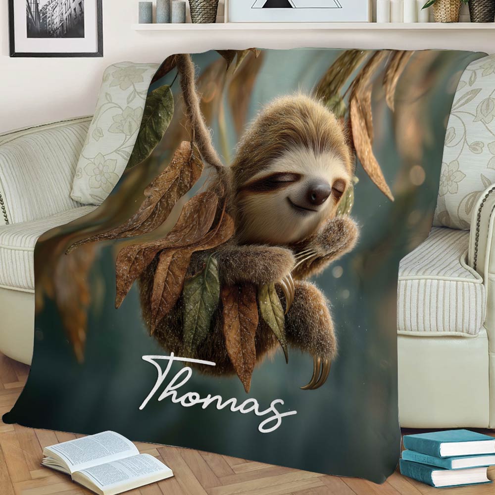 Cozy sloth blanket displayed in a living room with a sleepy sloth and woodland foliage