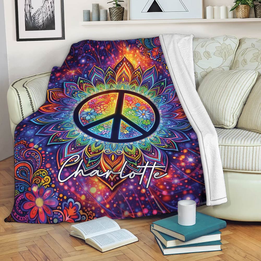 Colorful hippie throw blanket draped over a sofa with a floral peace sign and psychedelic mandala design