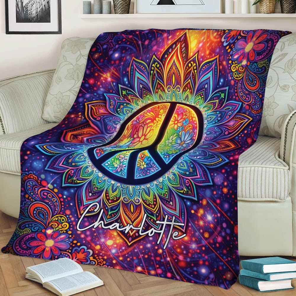 Hippie peace sign throw blanket displayed on a sofa with vibrant floral mandala and psychedelic artwork