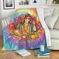 Colorful hippie throw blanket displayed on a sofa with tie-dye artwork, flowers, peace symbols, and boho styling