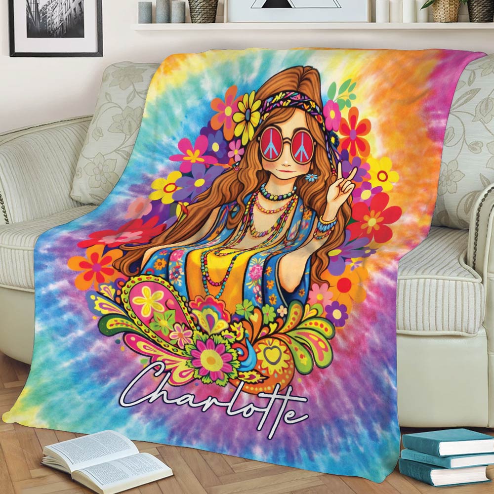 Bohemian hippie blanket draped over a sofa with vibrant tie-dye colors, floral artwork, and peace-themed illustration