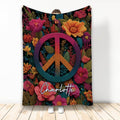 Hippie blanket with colorful floral artwork and a large rainbow peace symbol