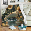 Cockatiel throw blanket displayed on a sofa with sunflower artwork and a peaceful nature theme