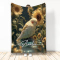 Cockatiel blanket featuring a resting bird among sunflowers, water, and warm golden botanical scenery