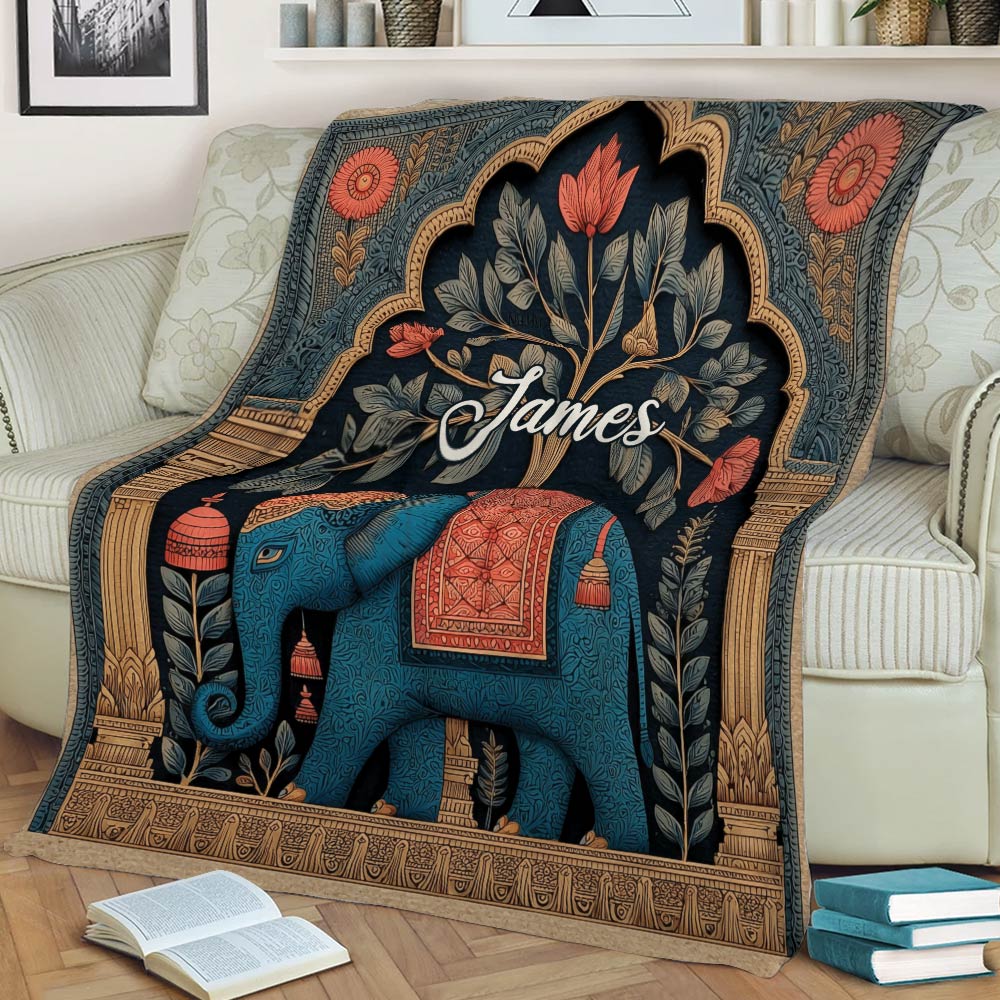 Decorative elephant blanket draped over a sofa in a cozy living room setting