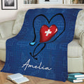 Nurse-themed couch blanket featuring a large stethoscope heart graphic and blue healthcare pattern
