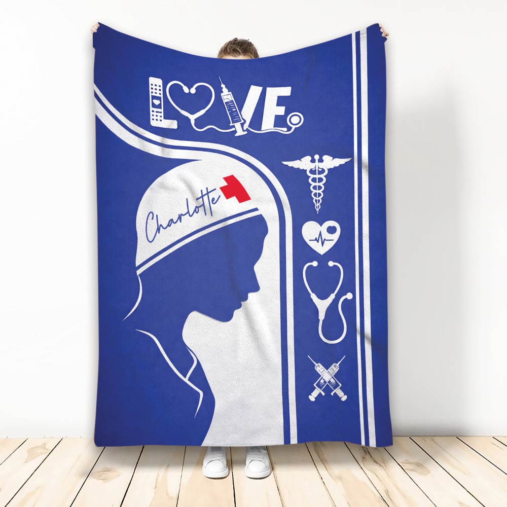 Blue nurse throw blanket displayed upright with medical icons and a nursing silhouette
