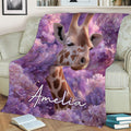 Giraffe and purple flower blanket draped across a cozy sofa