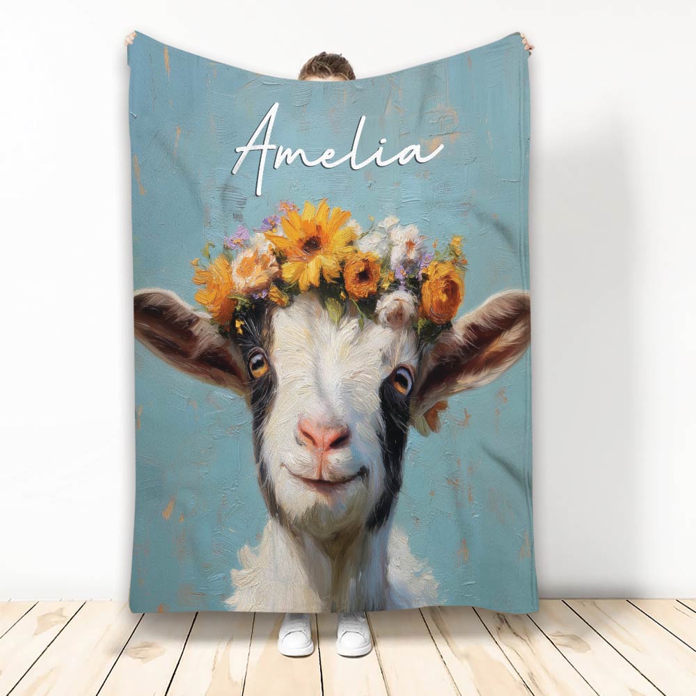 Floral goat artwork on a blue custom throw blanket displayed upright in a bright room