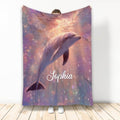 Pastel dolphin blanket with glowing ocean-inspired artwork and dreamy purple, pink, and blue colors