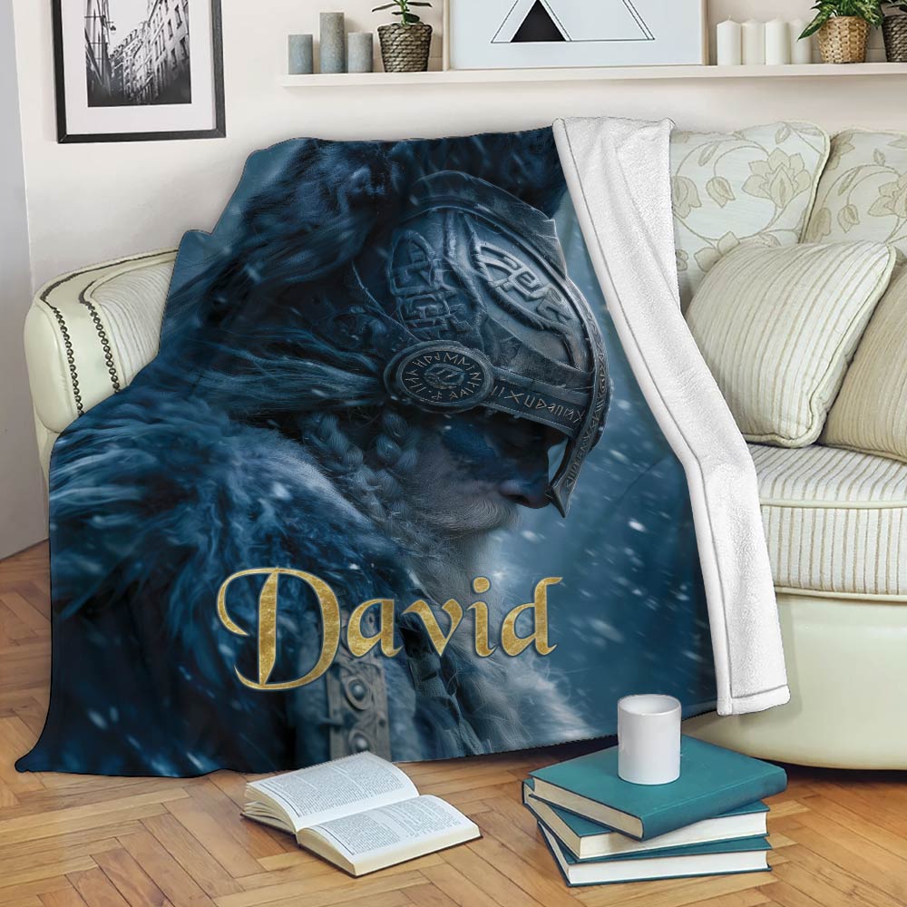 Viking warrior blanket draped over a sofa in a cozy living room with dramatic blue Norse artwork