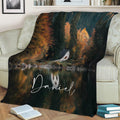 Lakeside cabin throw blanket displayed on a sofa with rich fall foliage and lake reflections