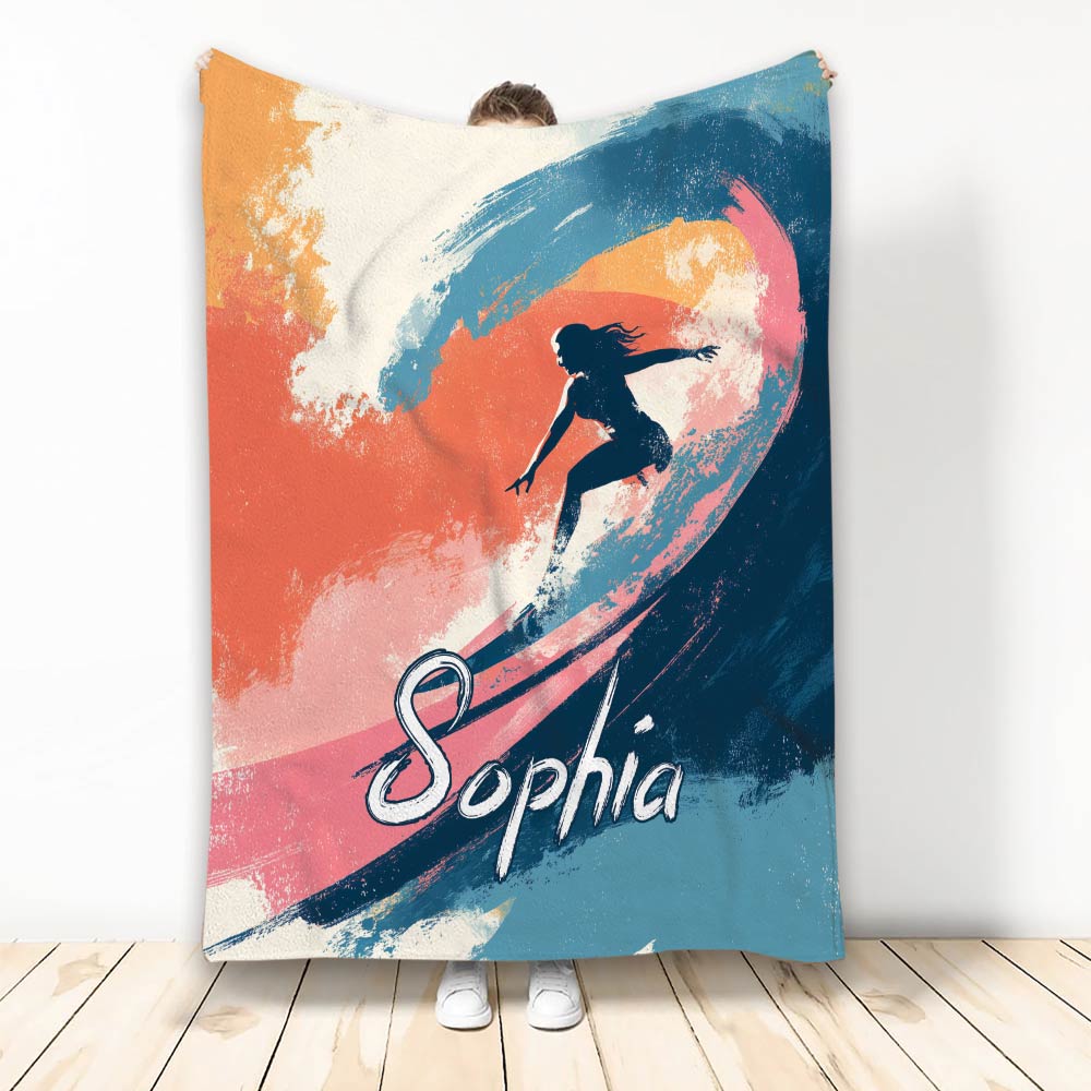 Surfing throw blanket featuring a dynamic surfer silhouette on colorful abstract waves