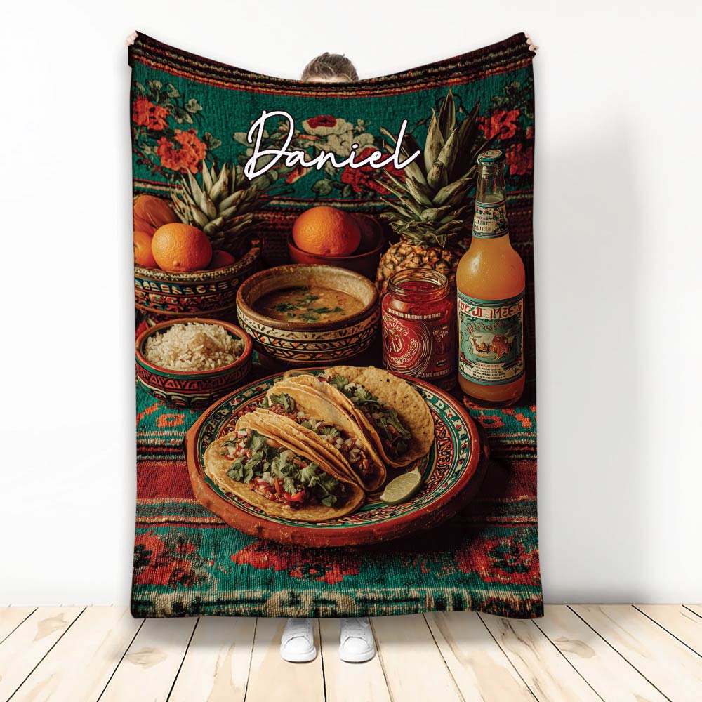 Taco throw blanket featuring plated tacos, fruit, salsa, colorful patterns, and vibrant food artwork