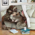 Hamster blanket displayed on a sofa with floral artwork, books, and a cozy reading nook