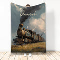 Railroader blanket featuring a vintage steam locomotive traveling through a dramatic cloudy landscape
