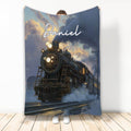 Railroader blanket featuring a dramatic steam locomotive emerging through stormy clouds