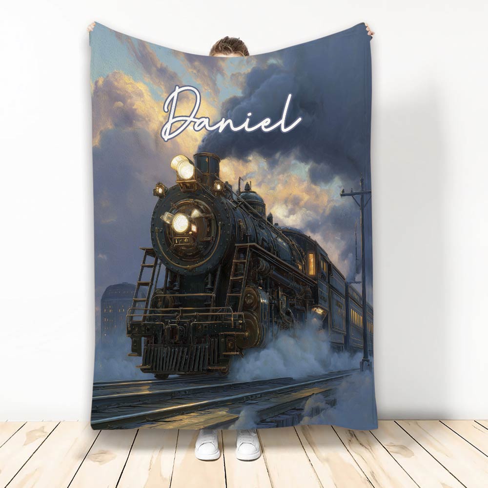 Railroader blanket featuring a dramatic steam locomotive emerging through stormy clouds