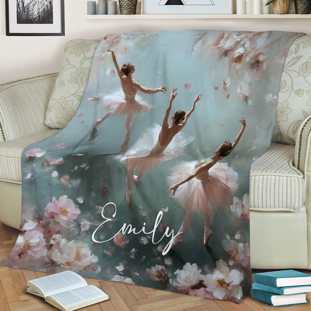 Ballerina throw blanket draped across a sofa, featuring romantic floral artwork and elegant ballet poses
