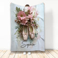 Ballet blanket with pink pointe shoes, floral watercolor artwork, and soft blue background