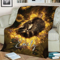 Raccoon throw blanket displayed on a chair with a peaceful woodland animal and sunflower artwork