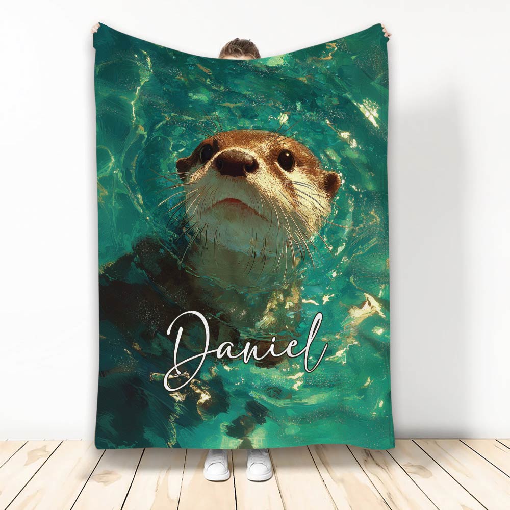 Otter throw blanket featuring a close-up swimming otter in teal and green artistic water
