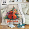 Cello throw blanket draped over a sofa with vibrant floral and musical note design