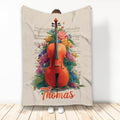 Custom cello throw blanket displayed upright with colorful flowers and sheet music artwork