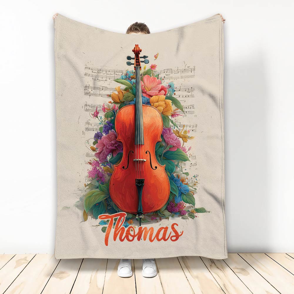 Custom cello throw blanket displayed upright with colorful flowers and sheet music artwork