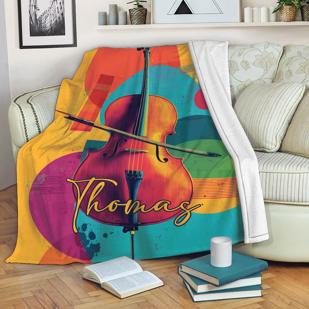 Colorful cello throw blanket draped over a sofa in a cozy living room